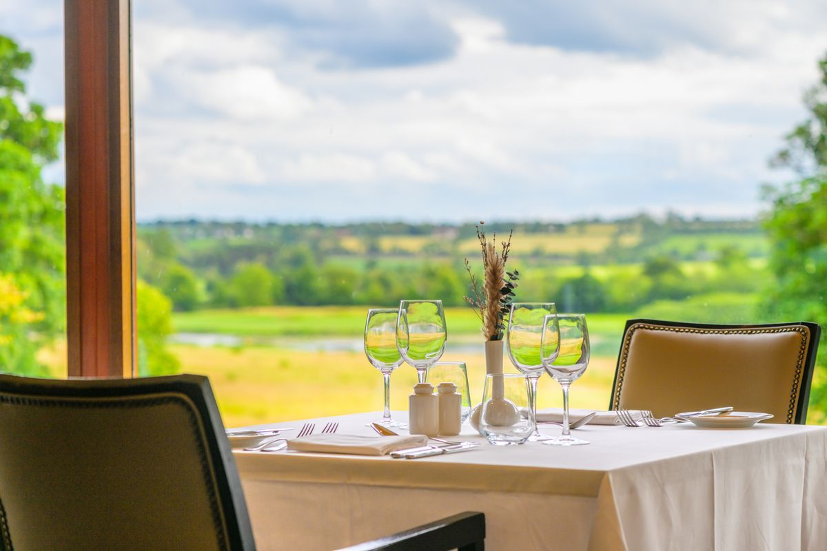 Sixteen Dining Room with placed seating beautiful view of Killeen Castle grounds in Meath