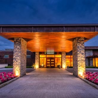 Cranmore Pavilion at Killeen Castle in warm nighttime lighting
